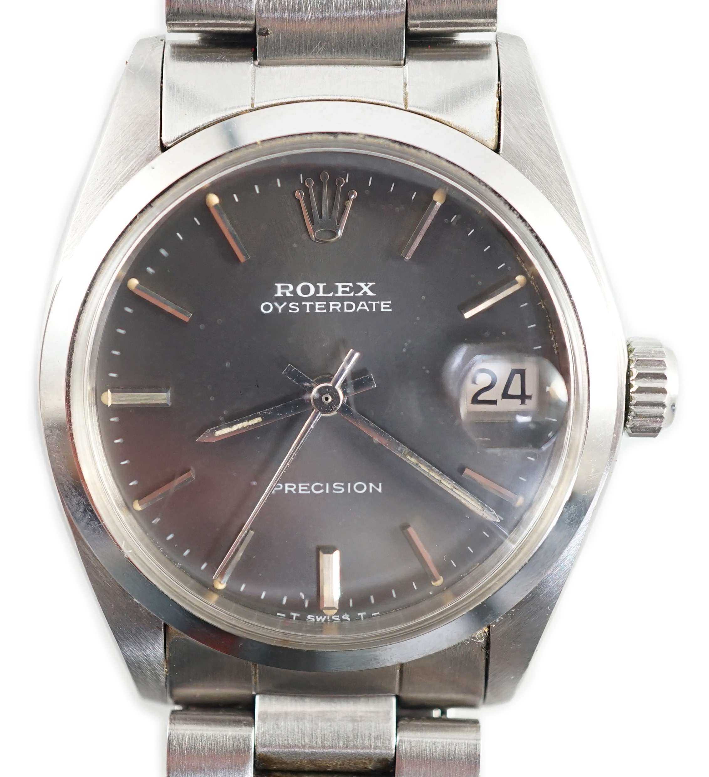 A 1980's mid-size stainless steel Rolex Oysterdate Precision manual wind wrist watch, on a stainless steel Rolex bracelet